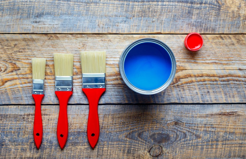 What is the best way to clean oil paint from brushes? If the bristles  appear stiff and less flexible after cleaning and drying, does this mean  there is still paint in the